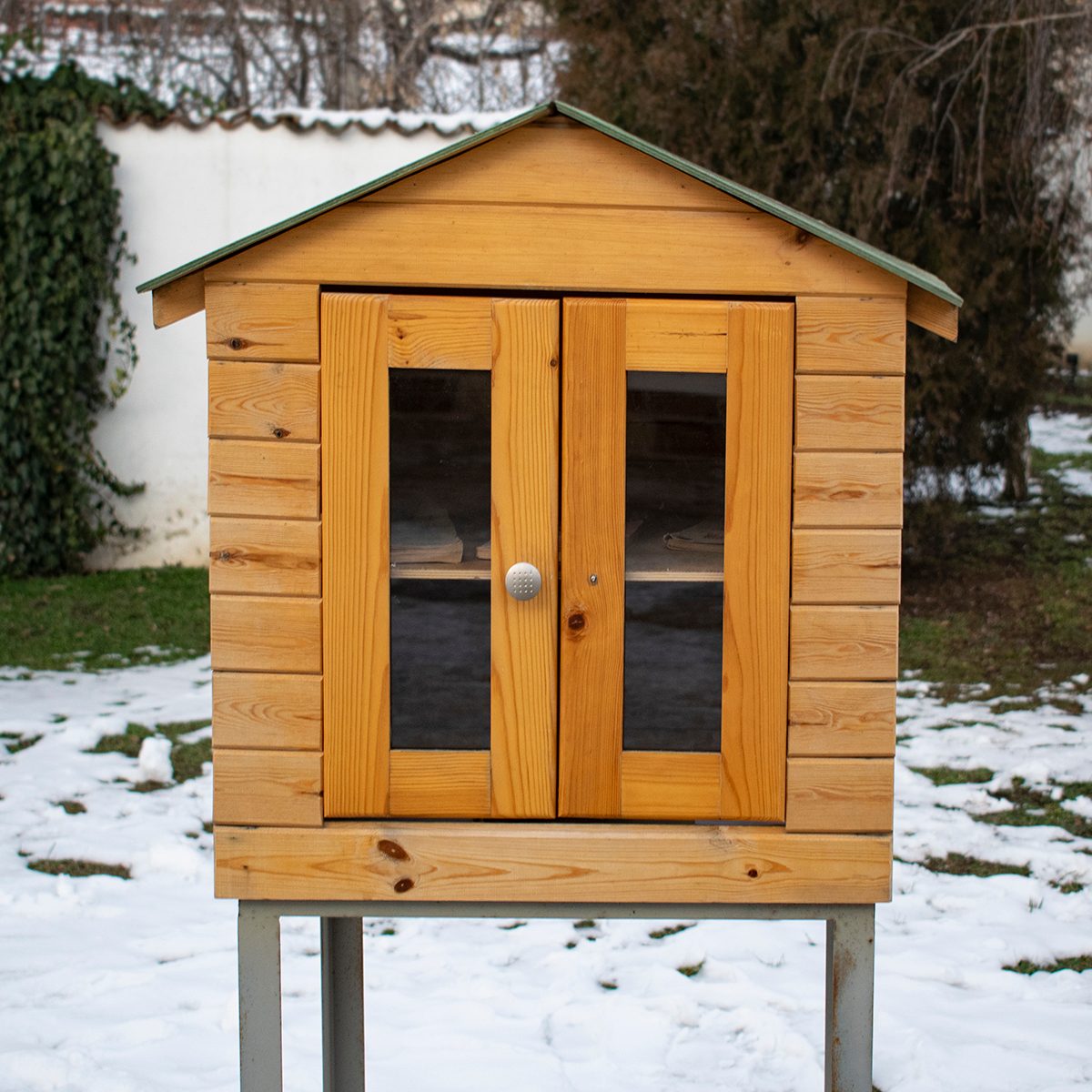 Giving free books exchange to others in the city. Small hand made wooden house with shelves for educational purpose.