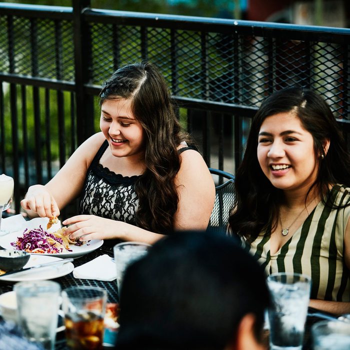 Friends eating together at a restaurant