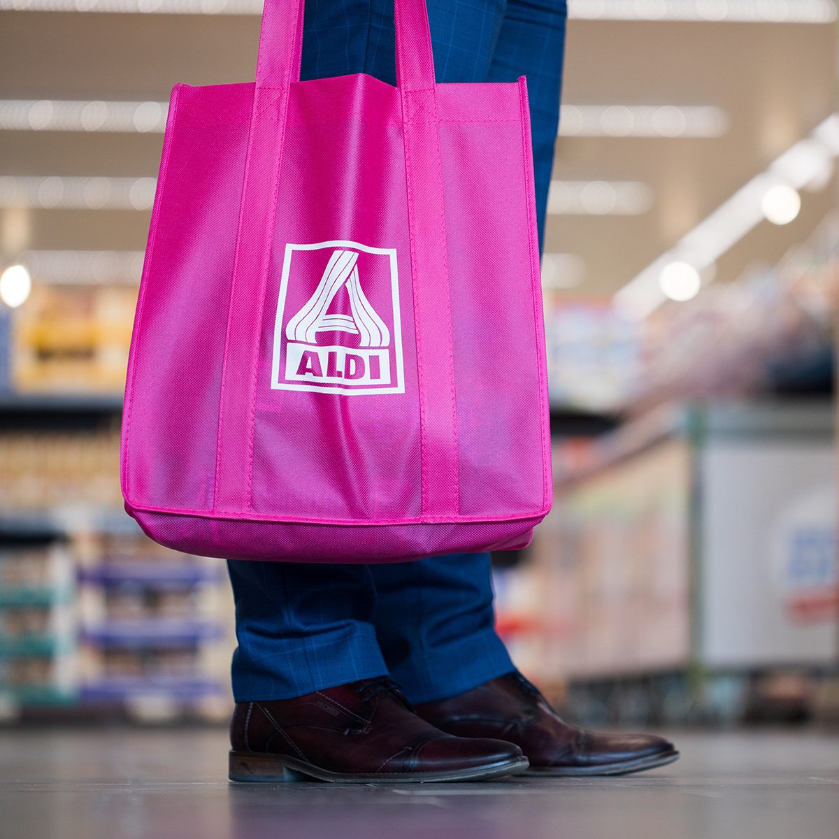 A man seen holding an ALDI North shopping bag with the logo in Herten, Germany, 04 April 2017. ALDI North has introduced a new branch conept. Photo: Rolf Vennenbernd/dpa | usage worldwide (Photo by Rolf Vennenbernd/picture alliance via Getty Images)