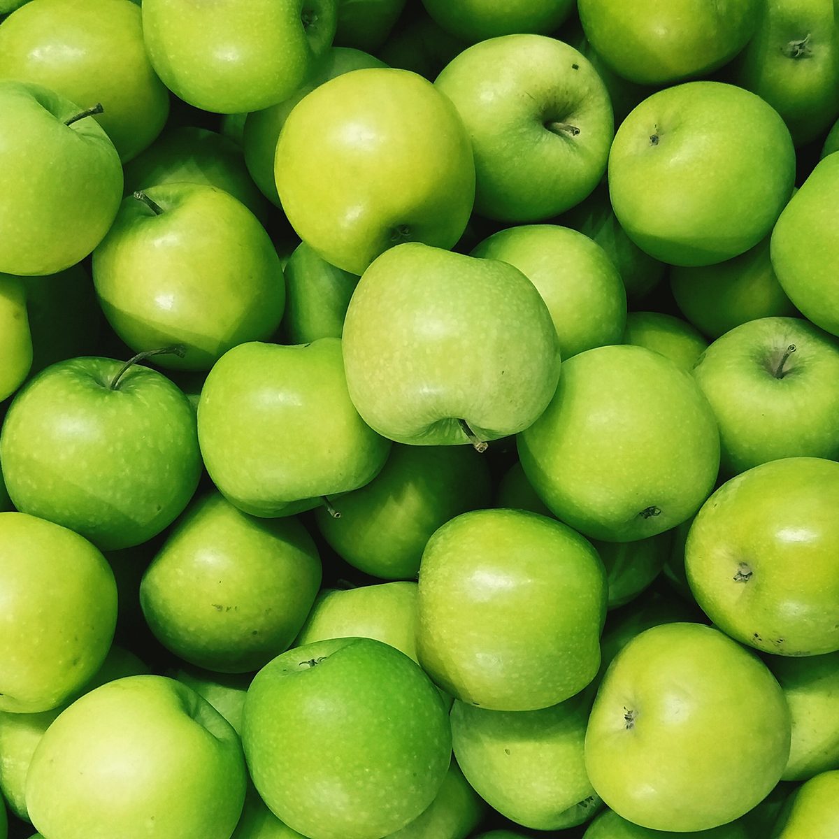 Full Frame Shot Of Granny Smith Apples For Sale In Market