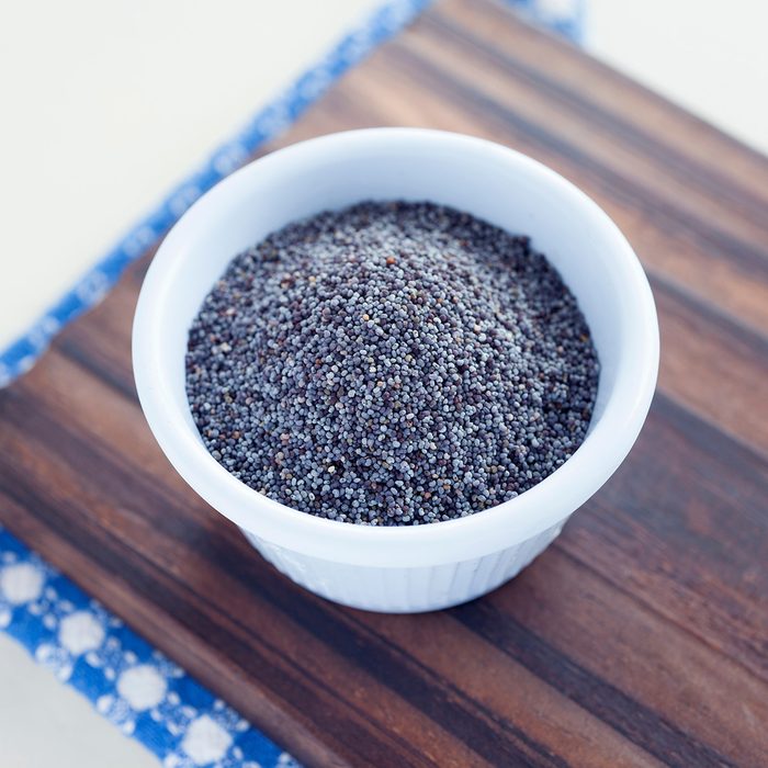 High Angle View Of Poppy Seeds On Table