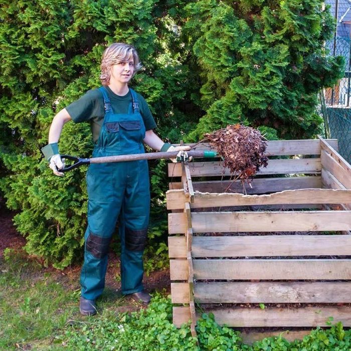 dfh17sep038_594051191_05-1200x1200 woman shoveling compost winter composting