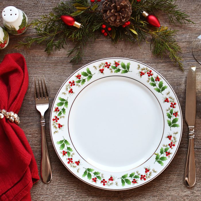 Directly Above Shot Of Eating Utensils On Dining Table During Christmas