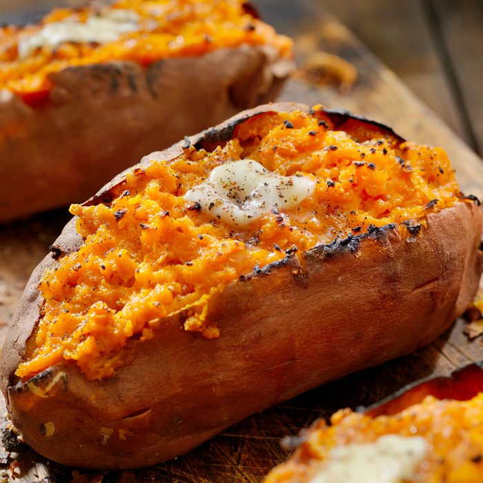 Twice Baked, Stuffed Sweet Potatoes with Melting Butter and Cracked Pepper