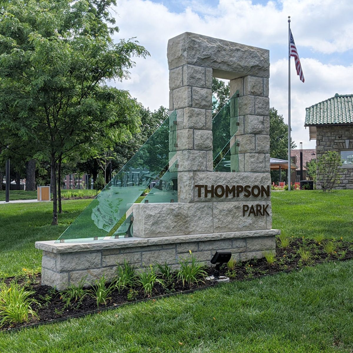 best picnic spot Thompson Park West Entrance Strang Carriage House Sign Web