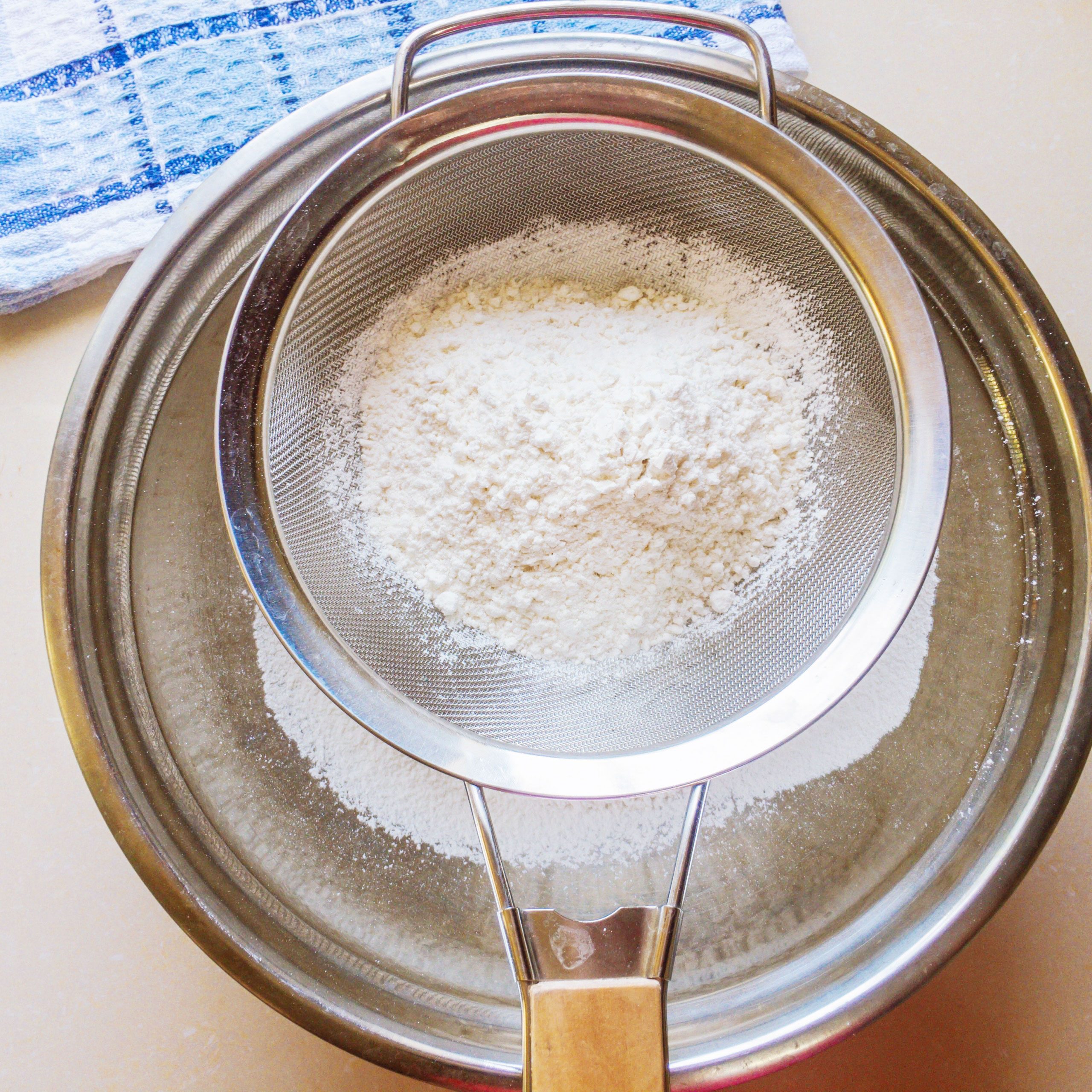 Sifting Flour for Jamaican Coco Bread