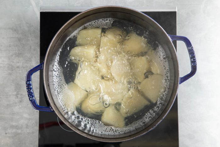 potatoes boiling in a pan