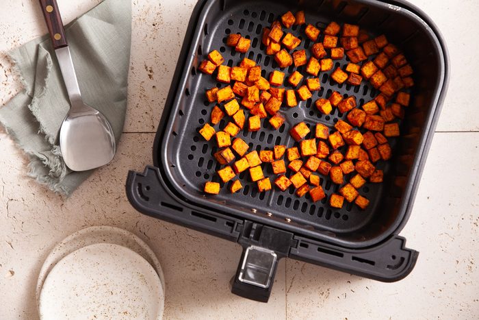 Sweet Potato cubes in an air fryer