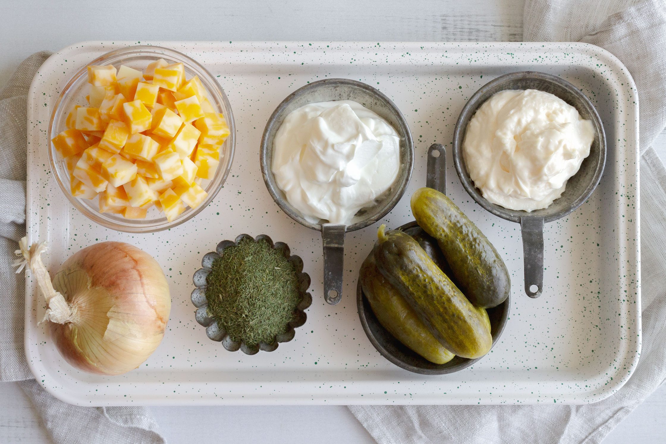 measured out ingredients in small bowls and containers on on a cutting board
