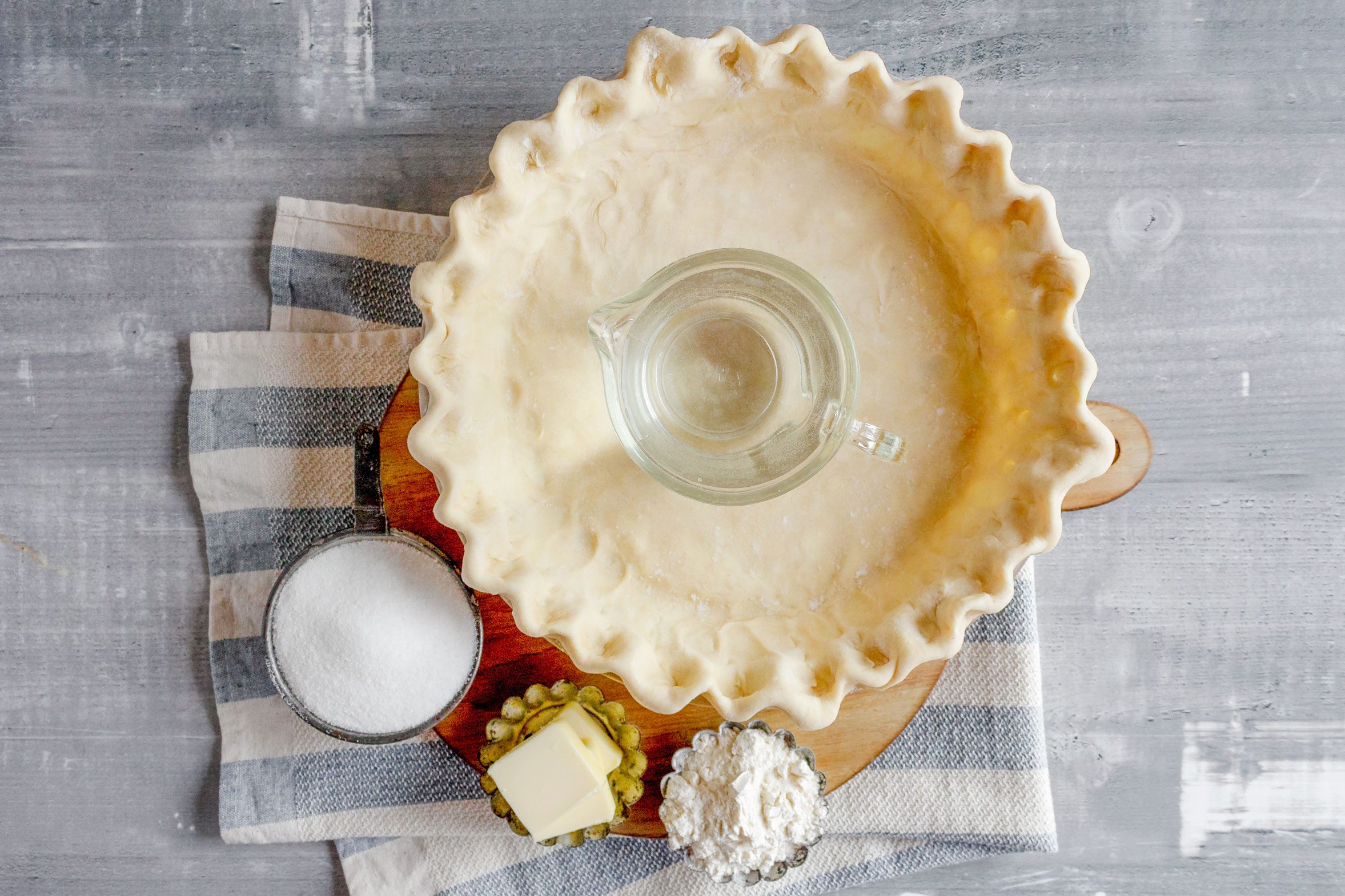 depression ere water pie ingredients laid out on a gray wood background