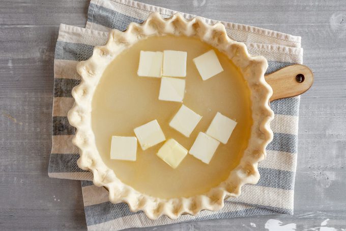 all ingredients added into the pie crust for water pie