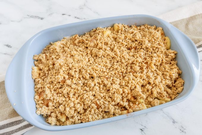 a blue baking dish with Amish 'apple Goodie