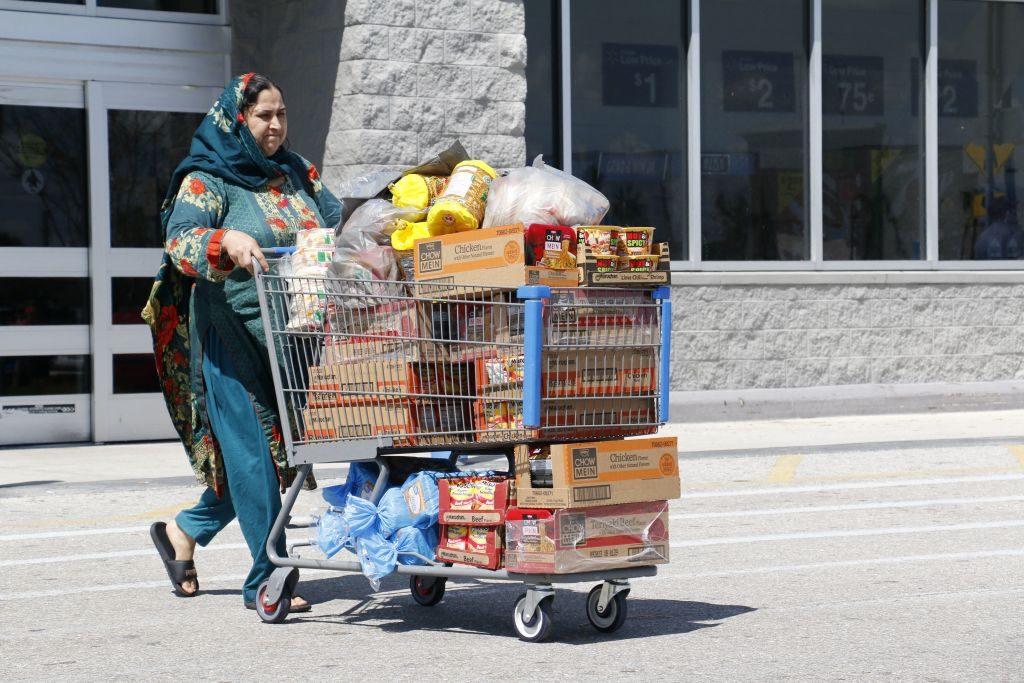 woman leaving grocery store