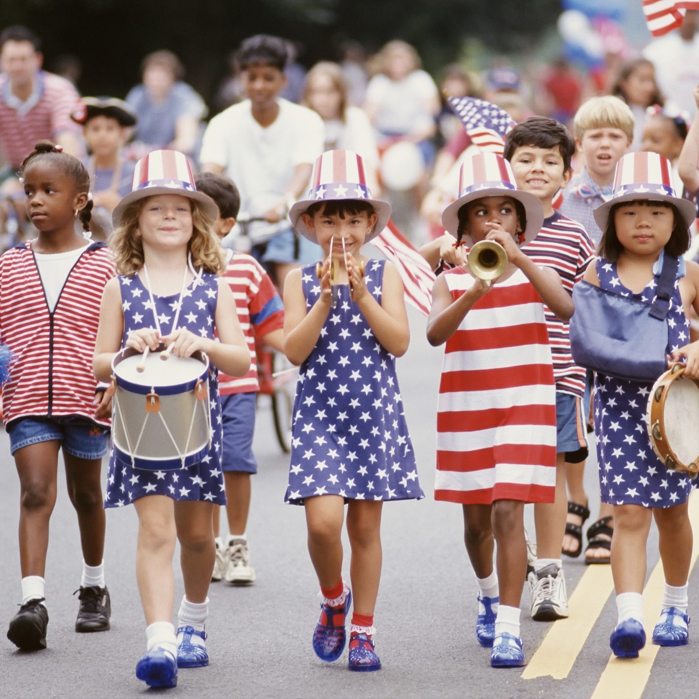 Children marching in 4th of July parade