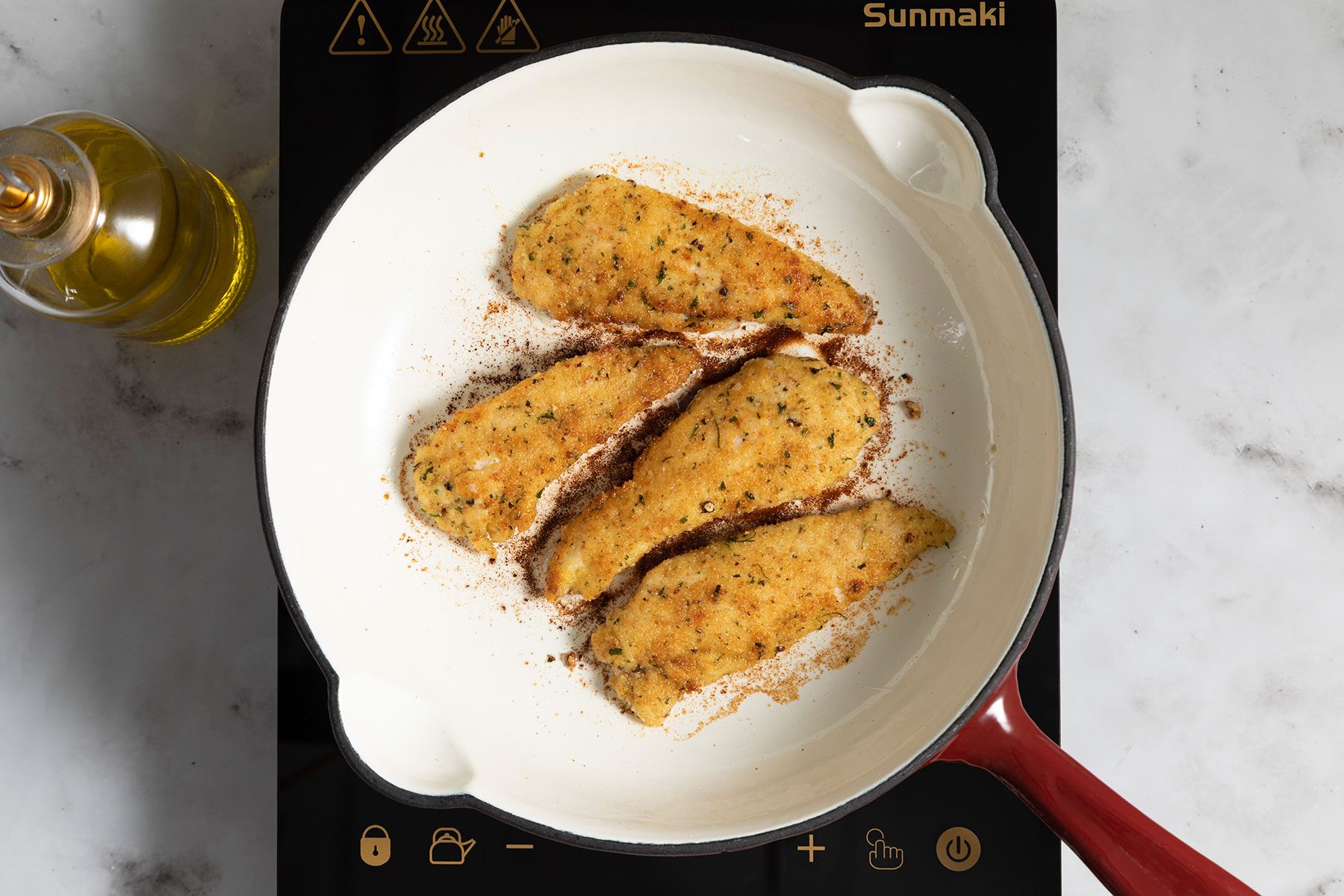 Frying chicken in pan