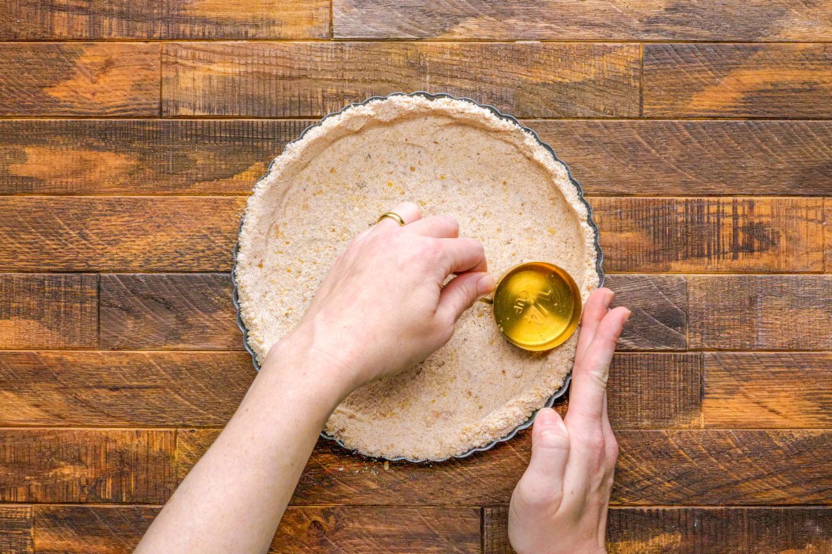 Flattening the mixture to make it smooth