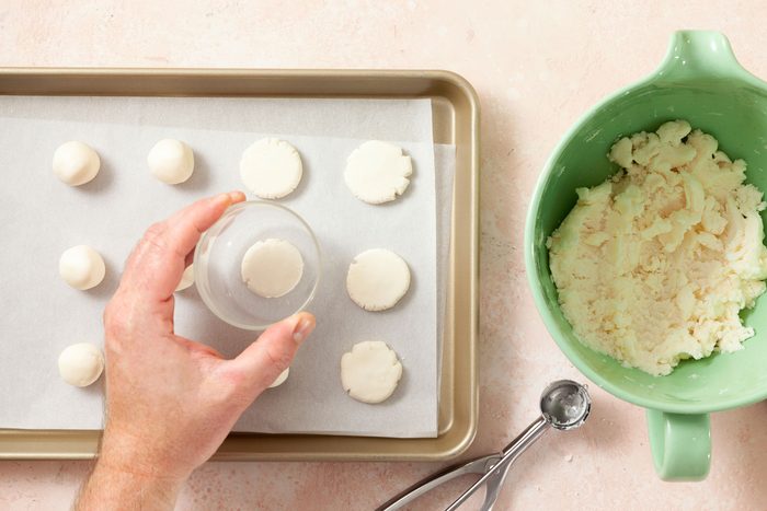 Flatten the dough balls