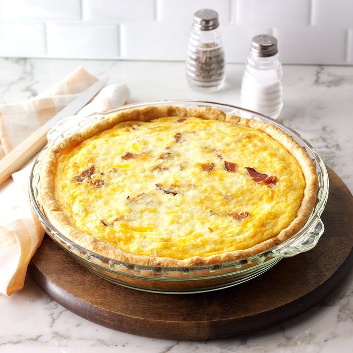 Breakfast Quiche on wooden board