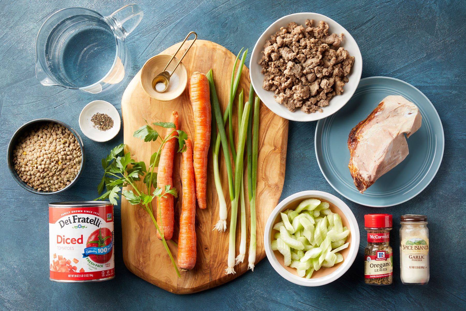 Ham Lentils Sausage and vegetables arranges on a countertop