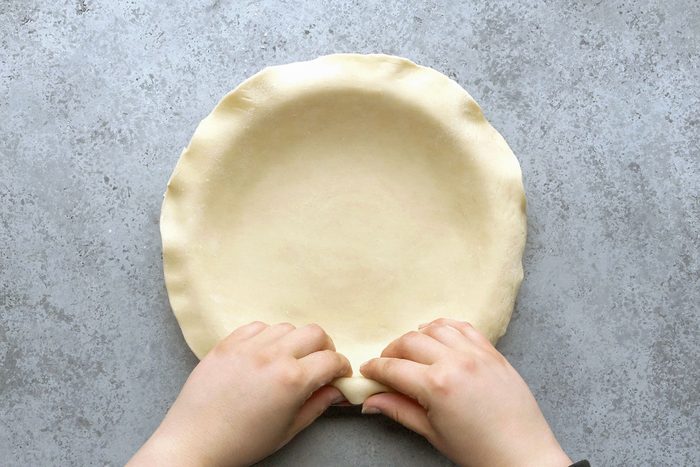 Trimming the edges of dough