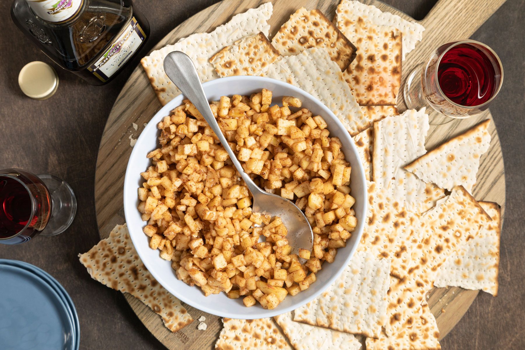 Charoset served in a large white bowl with matzo