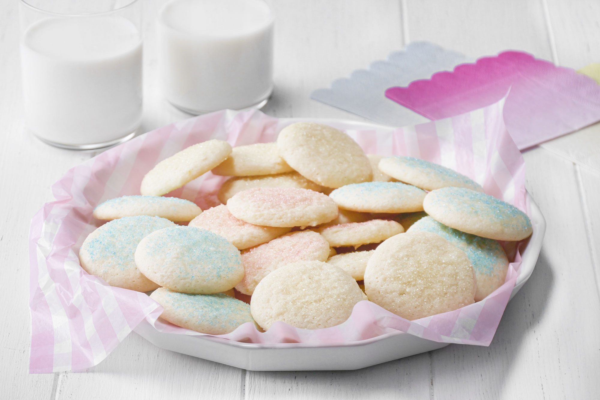 Drop Sugar Cookies served in plate with milk