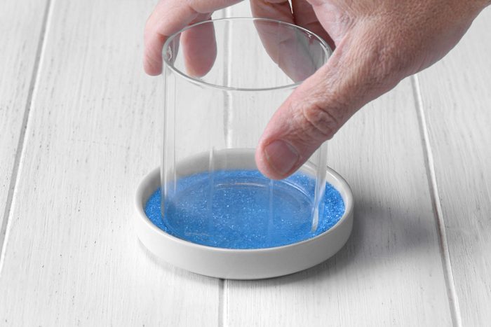 Pressing colored sugar on top of dough