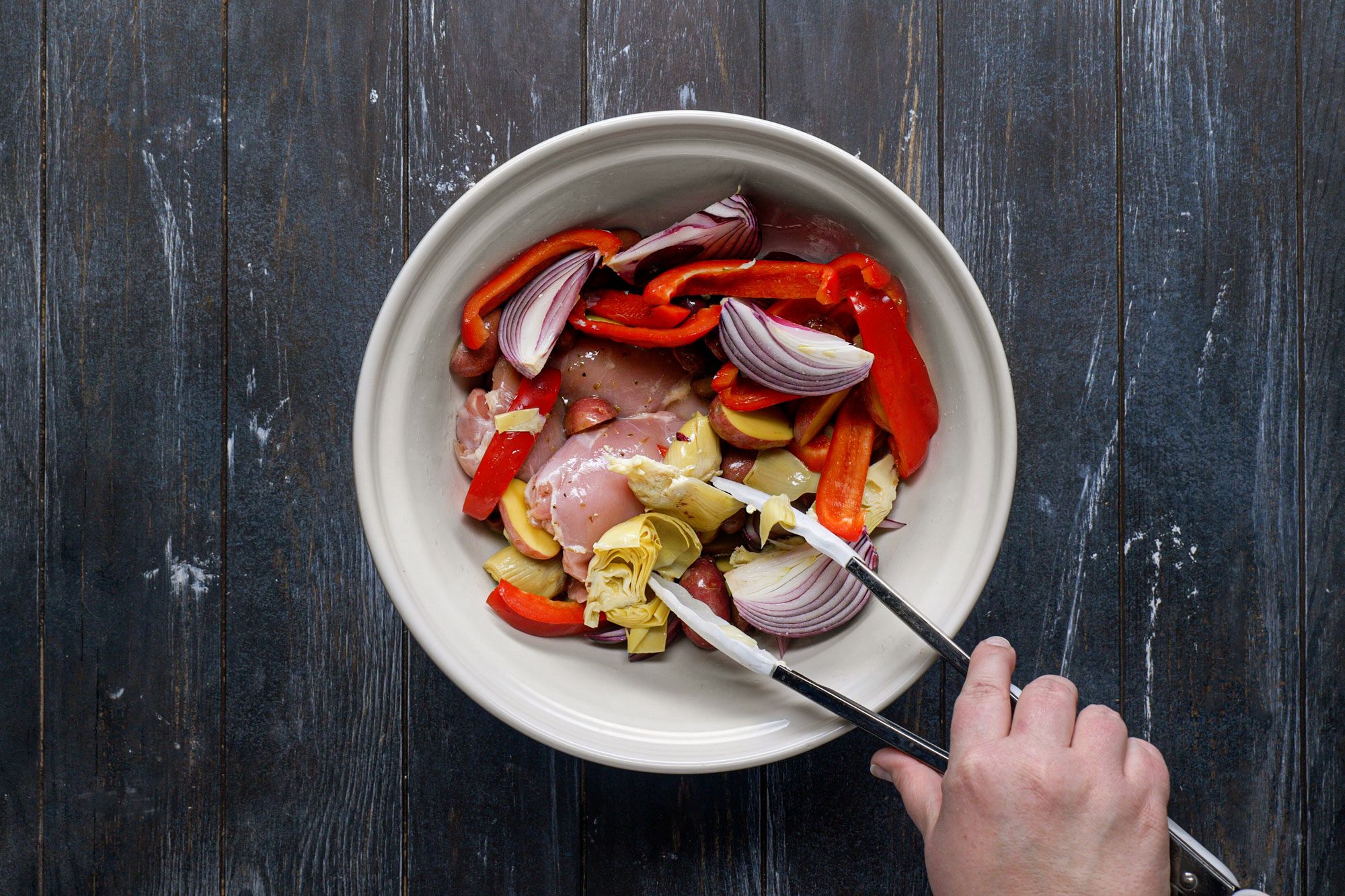 Toss the vegetables, chicken and vinaigrette in a large bowl