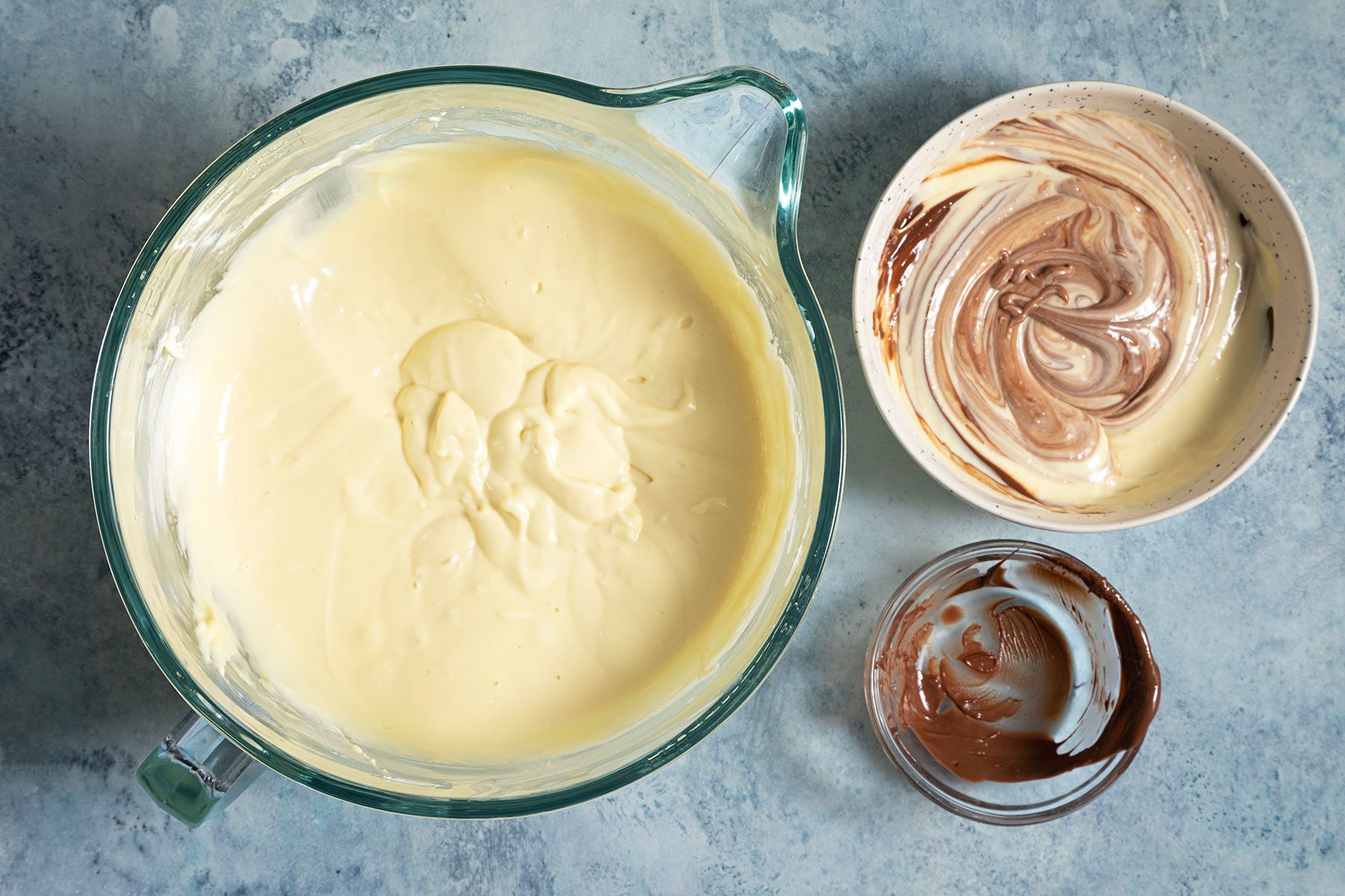 Adding one cup of melted chocolate in mixture
