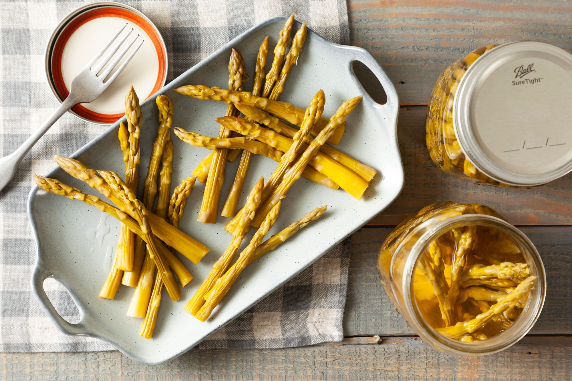 Brine the Asparagus in vinegar, salt, pickling spices, garlic and remaining water