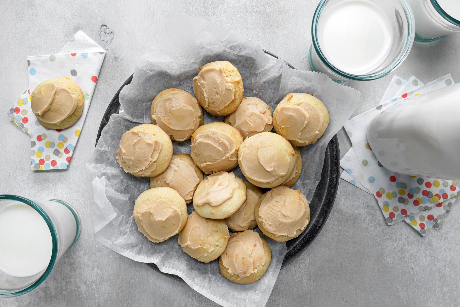 Sour Cream Drops served in a bowl with milk on the side