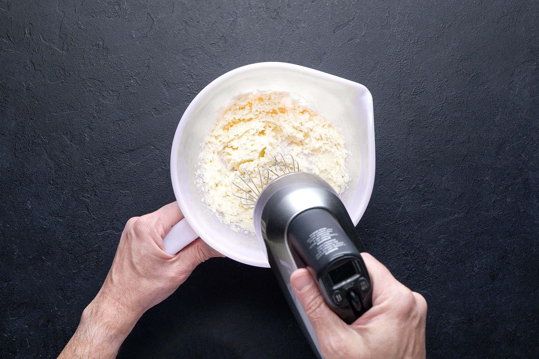 whisking the ingredients in a bowl 