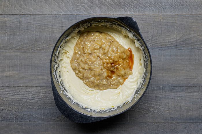 Adding Bananas and vanilla syrup in mixture