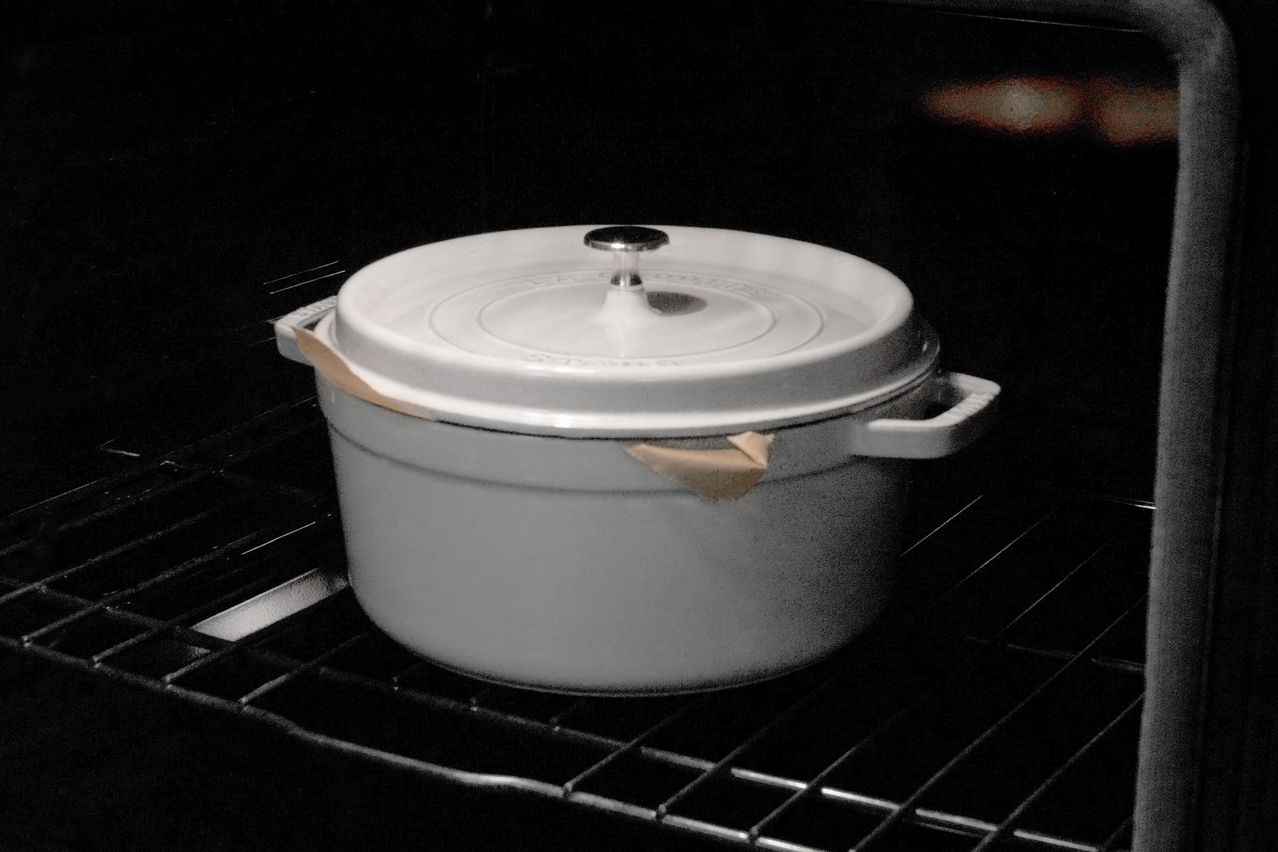 Baking the bread in oven kept in pot