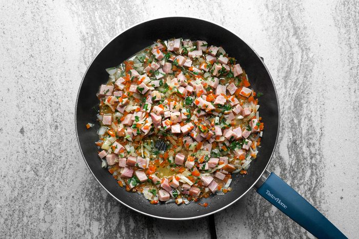 Cooking Ham and other vegetables in pan