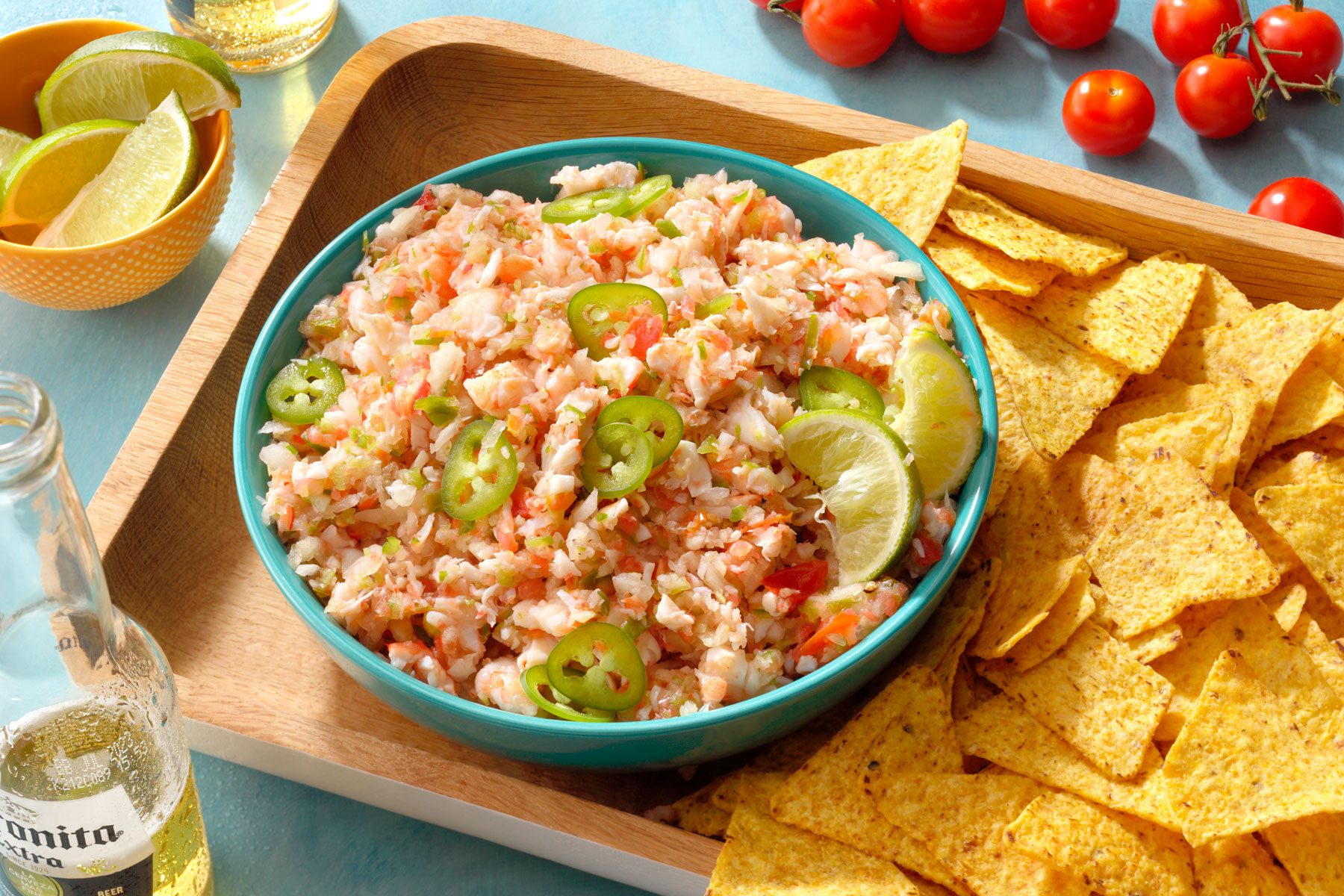 Lime Marinated Shrimp served with chips and beer