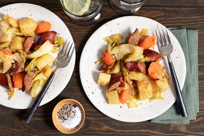 Sausage, Cabbage And Potatoes served on plate with fork
