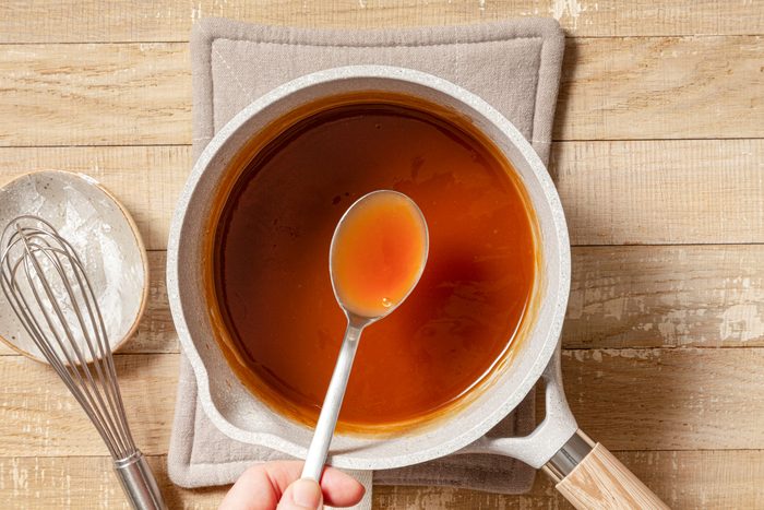 Slurry for Shrimp Egg Foo Young in a Saucepan on Wooden Surface