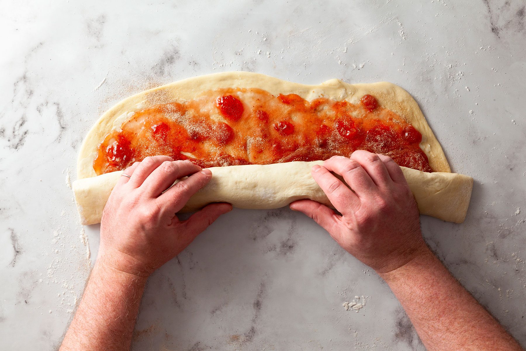 Rolling the Dough with Hands
