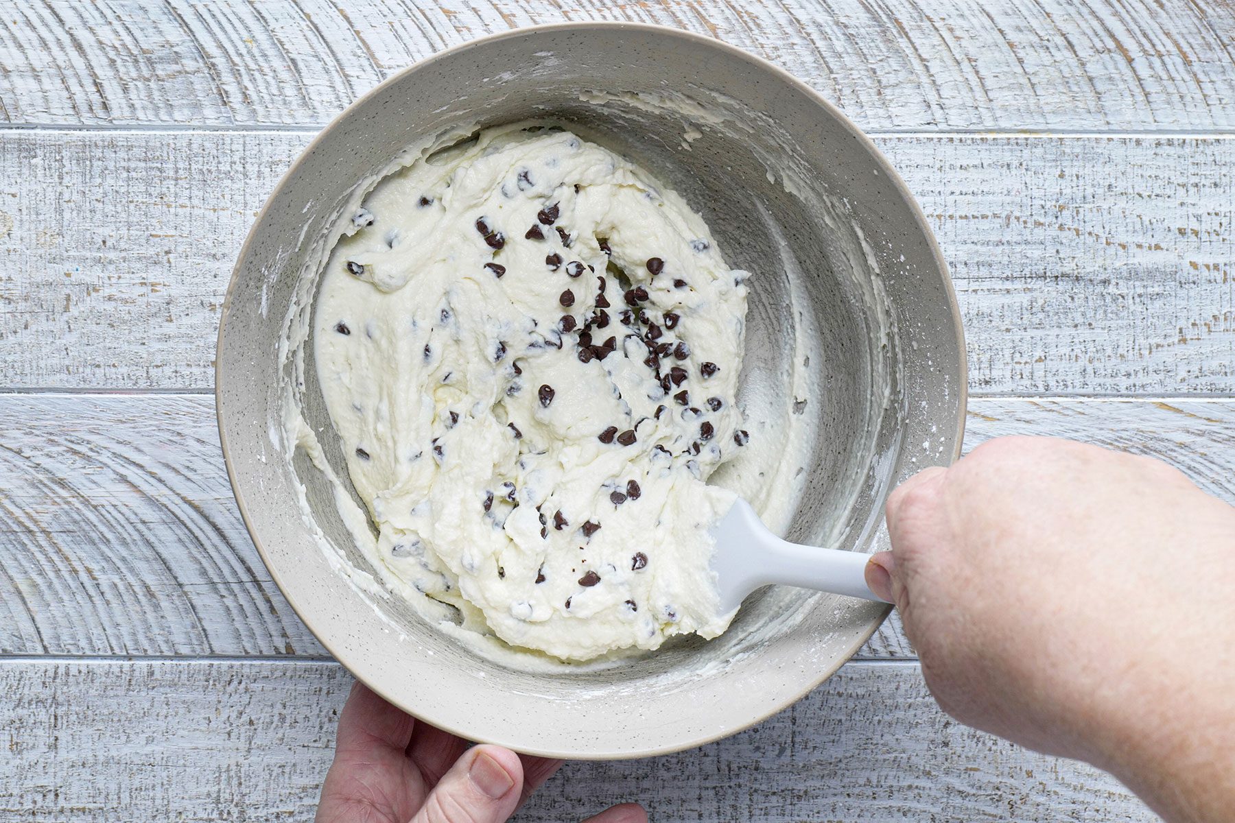 Mixing Chocolate Chips in Mixture with Spatula