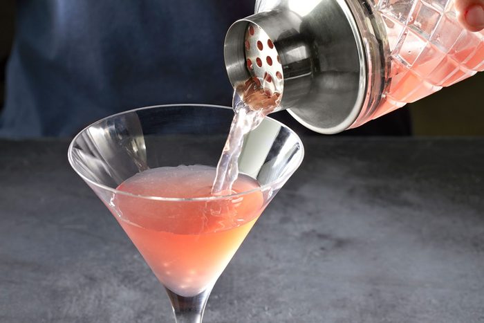 Strain your drink into a chilled cocktail glass