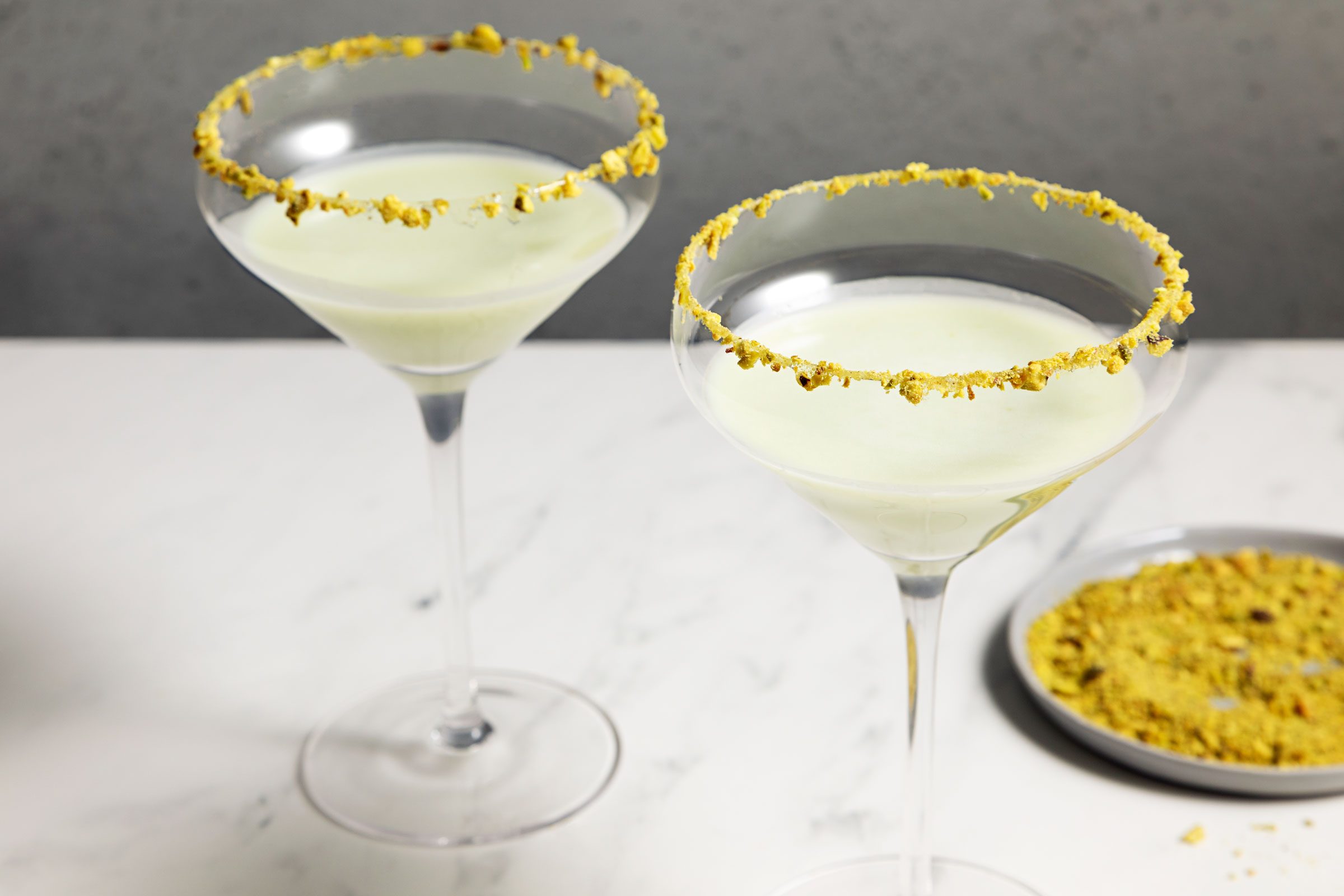 two Pistachio Martini served in glasses with a decorated rim