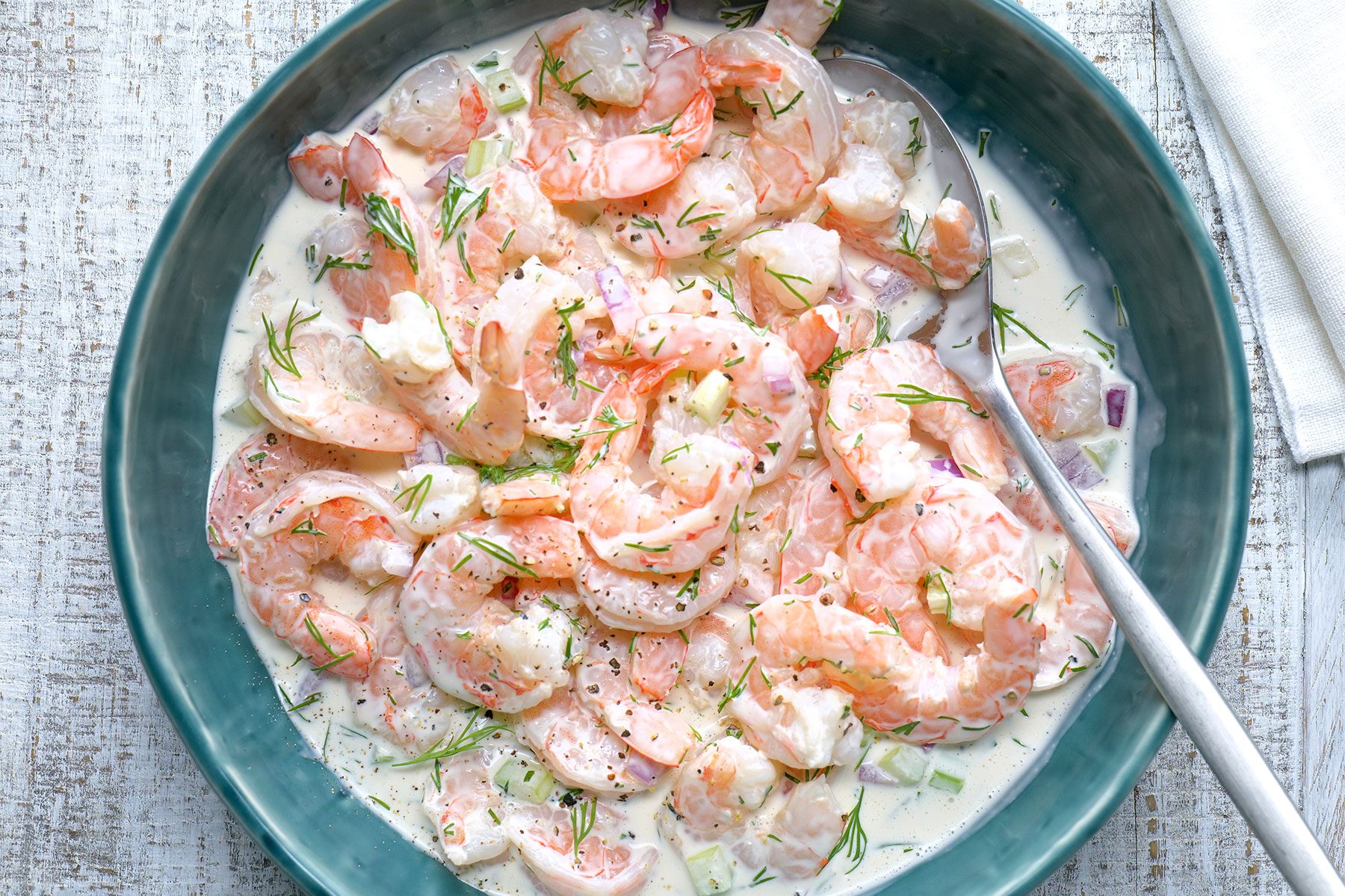 overhead shot of boiled shrimps in a large saucepan
