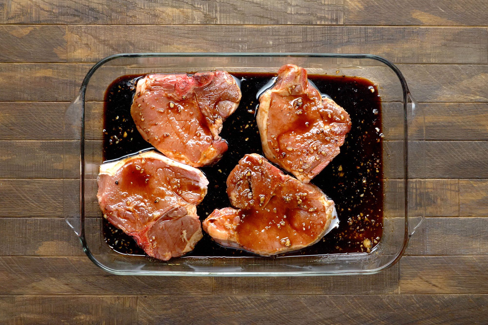 Added pork chops to coat with the brown sugar, soy sauce, garlic and pepper in a shallow dish