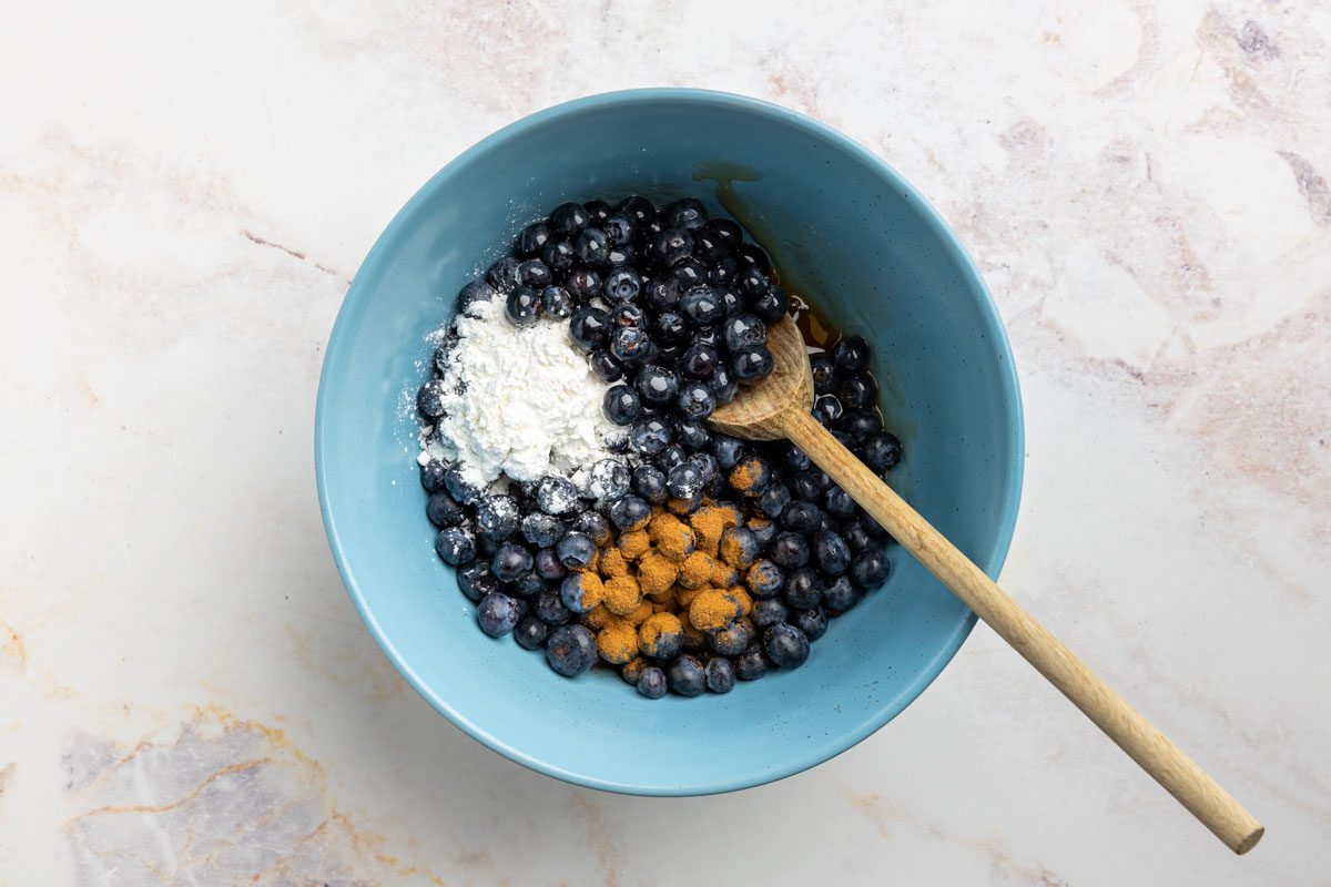 Taste of Home blueberry crisp recipe photo of photo of ingredients in bowl.