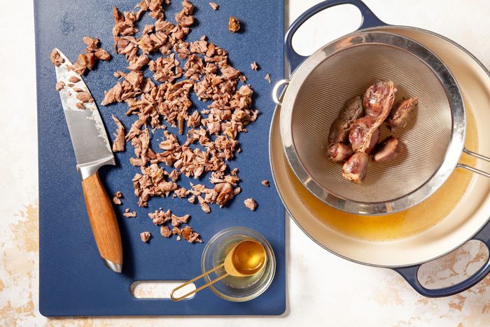 Finely chop giblets removed from large saucepan