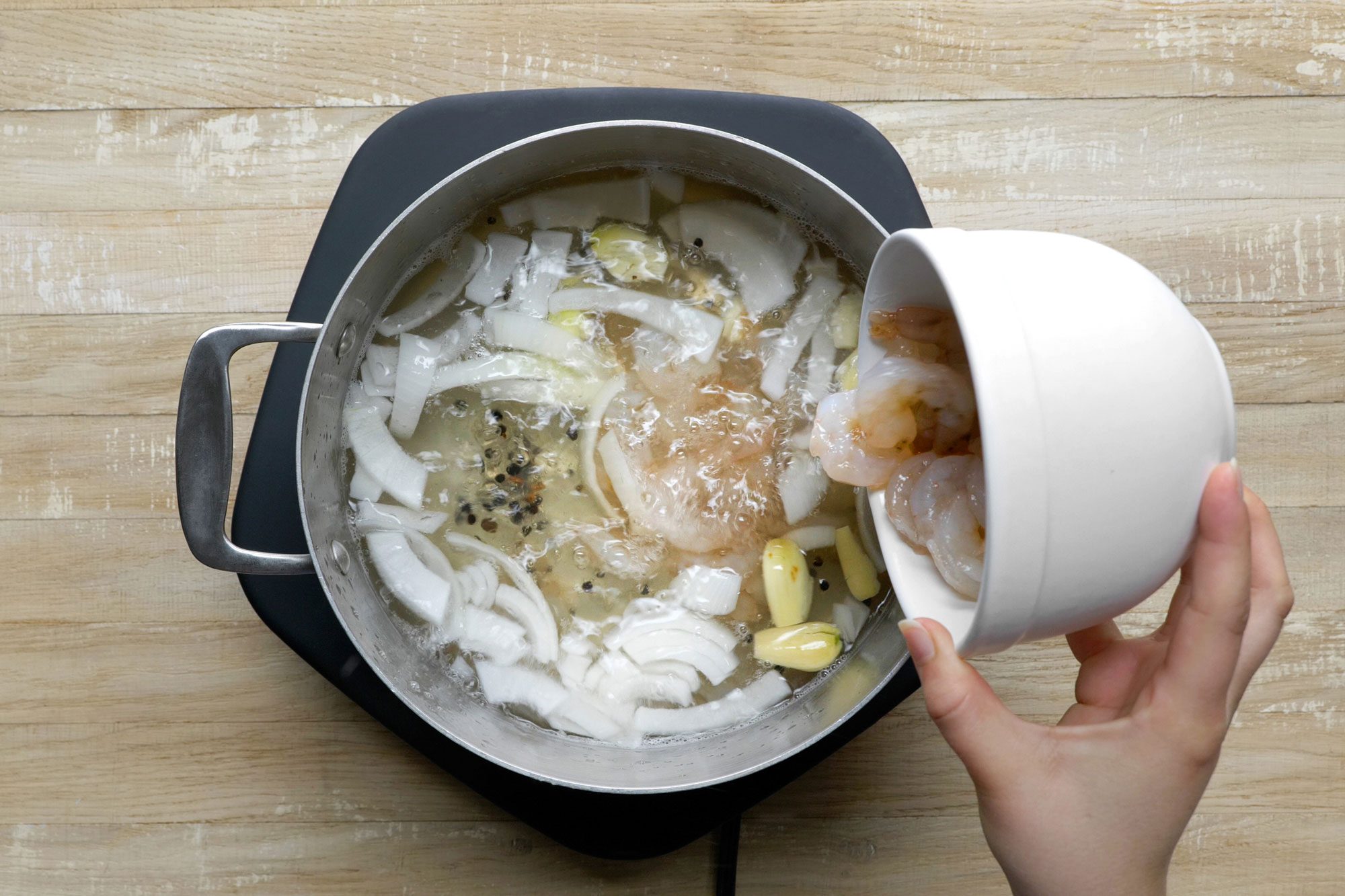 Add shrimp into the large saucepan