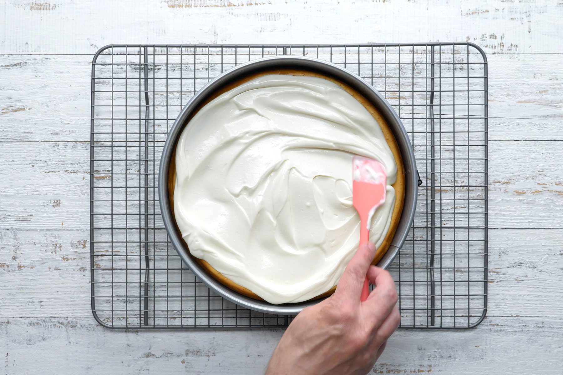 Overhead shot of topping; wire rack; wooden background;