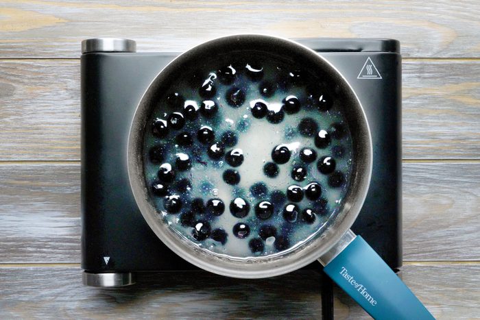 making blueberry sauce for french toast