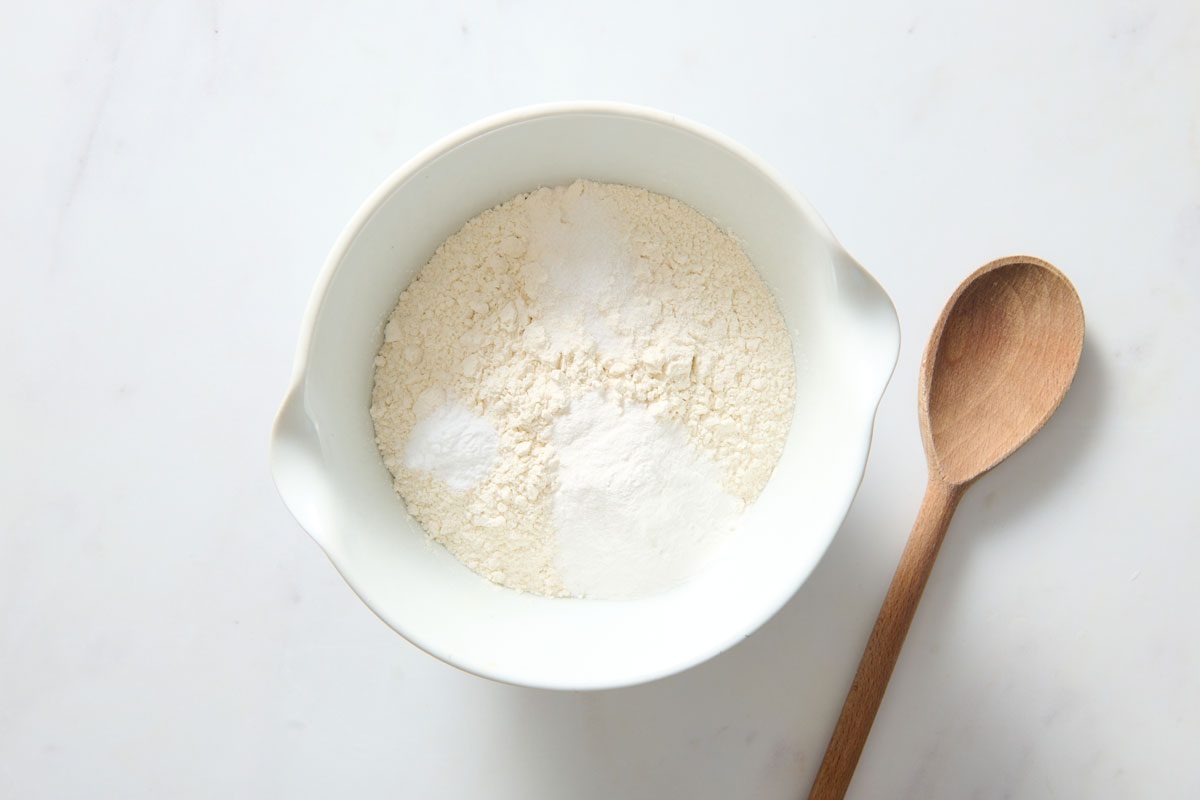Mixing Flour And Sugar And Baking Powder For The Batter of Zucchini Carrot Bread